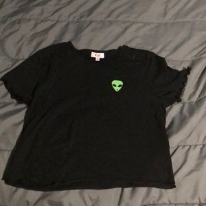 black shirt with alien on top right.